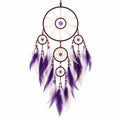 Attrape-rêves mural 35 x 85 cm en cordon textile violet et plumes décoratives style bohème